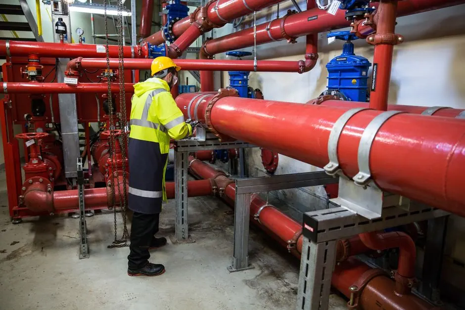 Technician using tools during a service visit